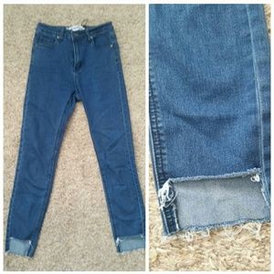 High rise waist raw step hem skinny jeans